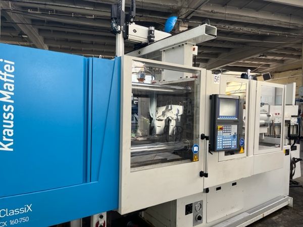Krauss Maffei KM 160-750 CX / Linia produkcyjna z robotem Wittmann - Krauss Maffei LRX100 i taśmociągiem / Bardzo dobry stan techniczny