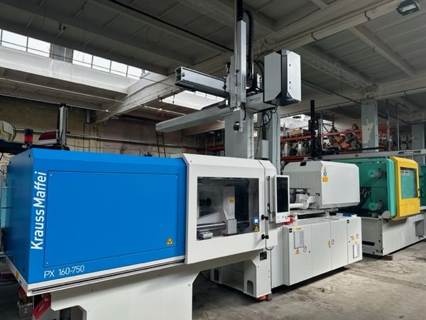 Krauss Maffei KM 160-750 PX z robotem Sepro Industrial Robot SDR 22S / Maszyna elektryczna / Godziny pracy: 2.923 h w trybie automatycznym 