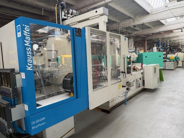 Krauss Maffei KM 420-2000 CX Blue Power z robotem Krauss Maffei LRX 250 / Godziny pracy: ca. h w trybie automatycznym