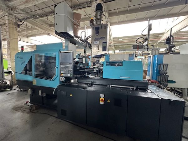 Sumitomo Demag Systec 100/420-310 z robotem Sepro SR SDR11 S3 TRANS / Maszyna hybrydowa